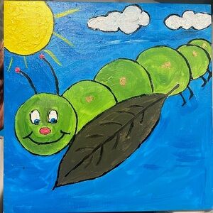 16x16 it’s has yellow sun and the caterpillar is green with gold on it